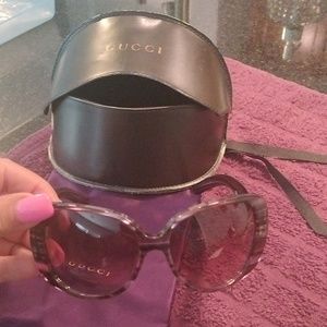 Gucci sunglasses with case and bag .great condition firm price